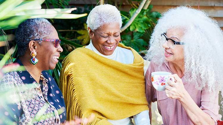 Three women discussing women and retirement